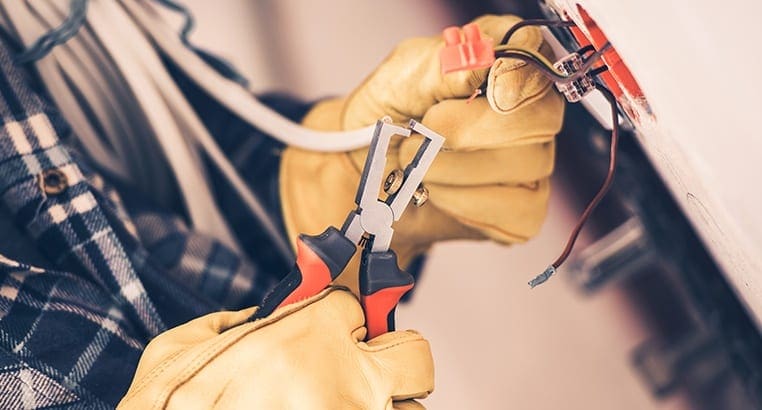 Electrician working on end of cable