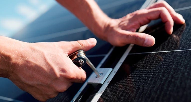 Electrician installing a solar pannel